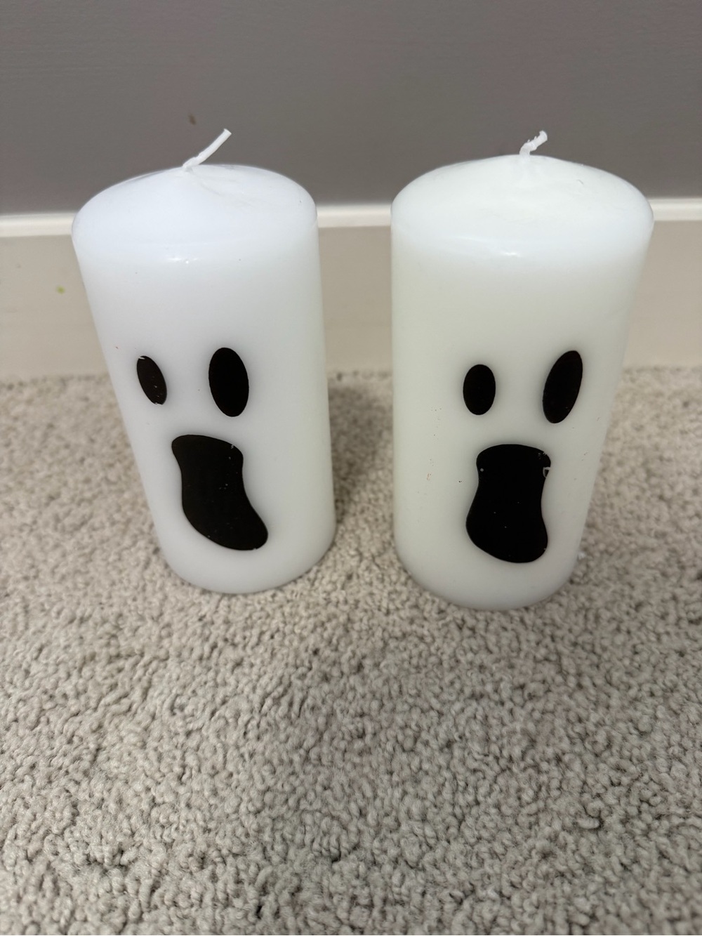 IKEA White Ghost Pillar Candle Pair with ghost faces